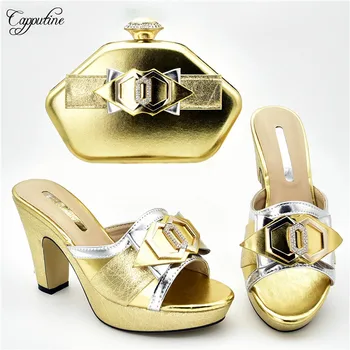 Most fashion wedding/party gold high heel slipper shoes with evening handbag set 636-1 heel height 11cm
Most fashion wedding/party gold high heel slipper shoes with evening handbag set 636-1 heel height 11cm