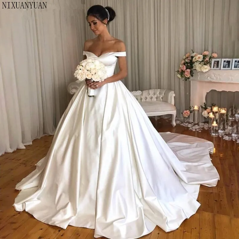 White Ball Gown Wedding Dresses 2019 Off The Shoulder V Neck Luxury Chapel Train Bride Dress Long Plus Size Vetidos De Novia
White Ball Gown Wedding Dresses 2019 Off The Shoulder V Neck Luxury Chapel Train Bride Dress Long Plus Size Vetidos De Novia