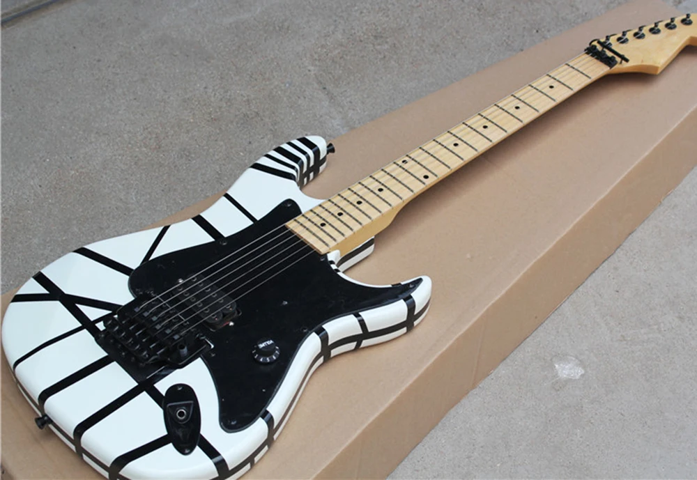 Tremolo Electric Guitar with Black and white stripe pattern,Maple Fingerboard,Black Pickguard,offering customized services
Tremolo Electric Guitar with Black and white stripe pattern,Maple Fingerboard,Black Pickguard,offering customized services