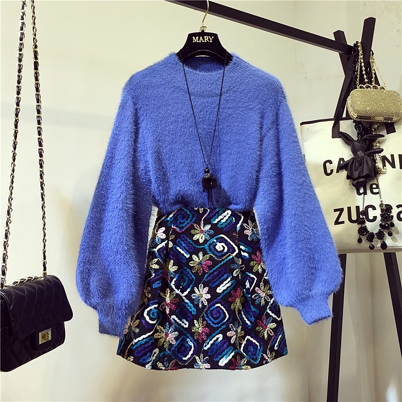 2019 Autumn Winter Women's Loose Pullover Sweater Long Sleeve Knitted Shirt + Short Wool Skirt 2 Pieces Embroidered Skirt Suit
2019 Autumn Winter Women's Loose Pullover Sweater Long Sleeve Knitted Shirt + Short Wool Skirt 2 Pieces Embroidered Skirt Suit