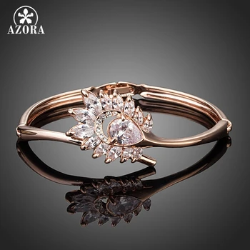 AZORA Irregular Sunflower Rose Gold Color Clear Cubic Zirconia Bangle Bracelet TB0058
AZORA Irregular Sunflower Rose Gold Color Clear Cubic Zirconia Bangle Bracelet TB0058