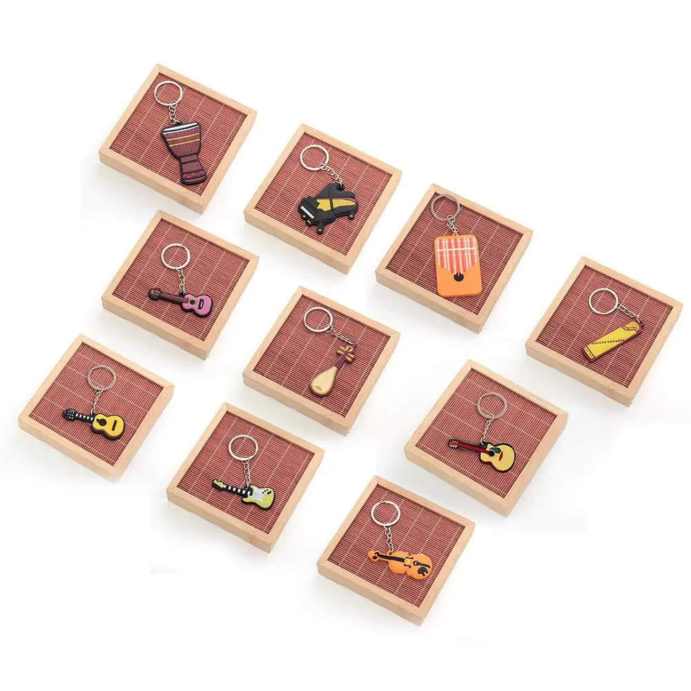 Creative Key Hook Guitar Style Musical Instrument Drum Keychain Guitar Ukulele Guzheng Kalimba Piano Pendant
Creative Key Hook Guitar Style Musical Instrument Drum Keychain Guitar Ukulele Guzheng Kalimba Piano Pendant