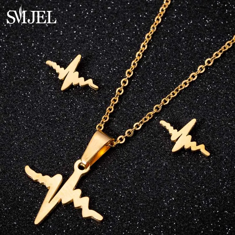SMJEL Creative ECG Ear Studs Necklaces Stainless Steel Heartbeat Earrings for Women Girl Minimalist Jewelry Couple Birthday Gift
SMJEL Creative ECG Ear Studs Necklaces Stainless Steel Heartbeat Earrings for Women Girl Minimalist Jewelry Couple Birthday Gift