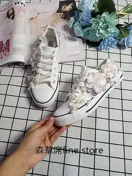 2019 European Station Korean version water drill pearl hand sewing string pearl lace low-end canvas shoes flat sole handmade
2019 European Station Korean version water drill pearl hand sewing string pearl lace low-end canvas shoes flat sole handmade