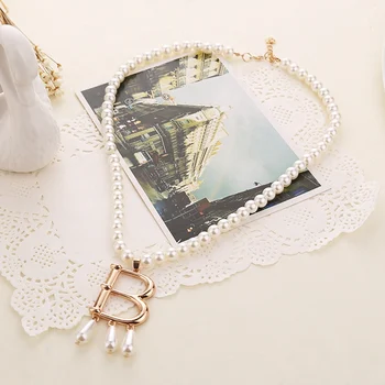 New Fashion Movie The Tudors Imitation pearl Necklace wholesale Women ANN BOLEYN THE TUDORS B Combo Ugly Betty Pendant Necklace
New Fashion Movie The Tudors Imitation pearl Necklace wholesale Women ANN BOLEYN THE TUDORS B Combo Ugly Betty Pendant Necklace