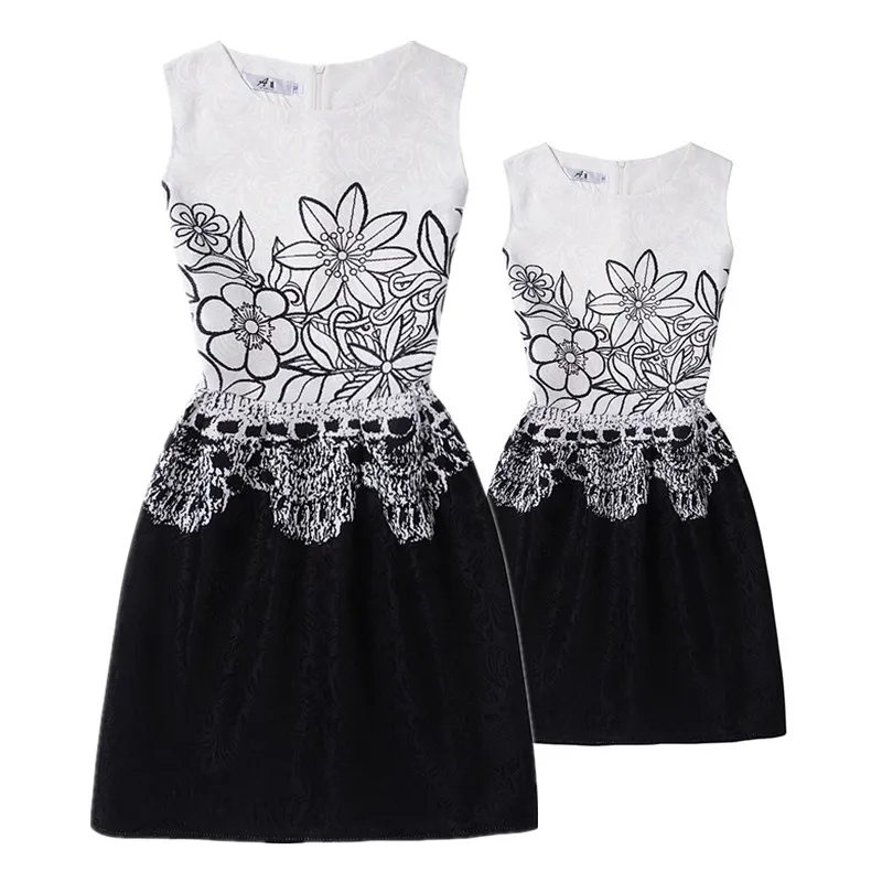 Mom and Daughter Dress Matching family look girl and mother Dresses fashion flower print sleeveless Mother daughter clothes
Mom and Daughter Dress Matching family look girl and mother Dresses fashion flower print sleeveless Mother daughter clothes