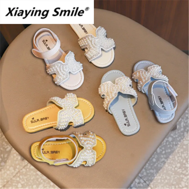 Girl slippers 2019 Korean version of the new summer fashion pearl diamond sandals leisure word indoor and outdoor slippers trend
Girl slippers 2019 Korean version of the new summer fashion pearl diamond sandals leisure word indoor and outdoor slippers trend