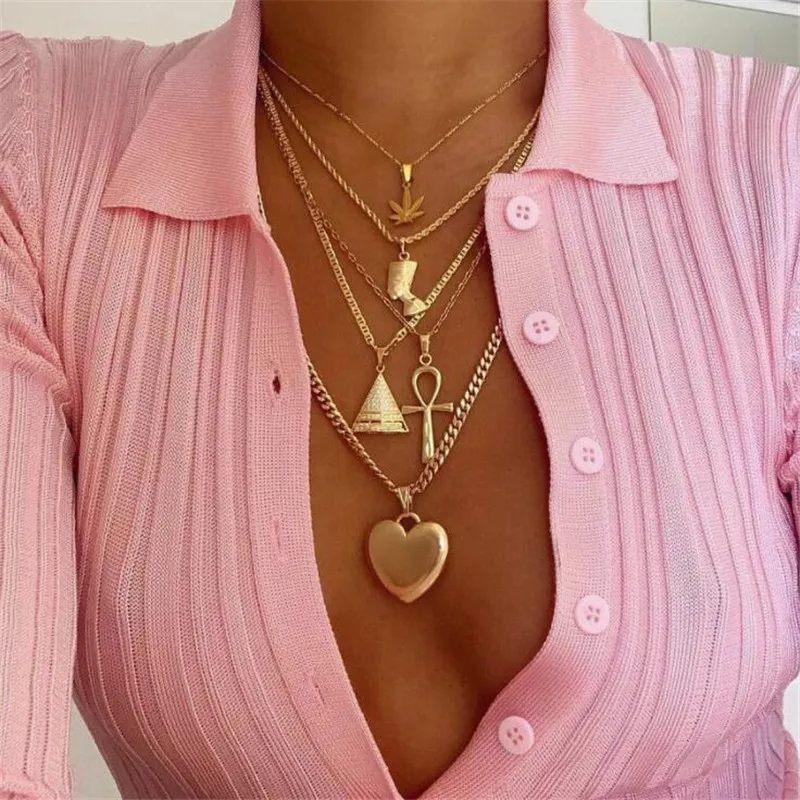 GIVVLLRY Multilayered Chain Necklace Boho Jewelry Punk Egyptian Figures Pyramid Cross Heart Leaf Pendant Necklace for Women
GIVVLLRY Multilayered Chain Necklace Boho Jewelry Punk Egyptian Figures Pyramid Cross Heart Leaf Pendant Necklace for Women