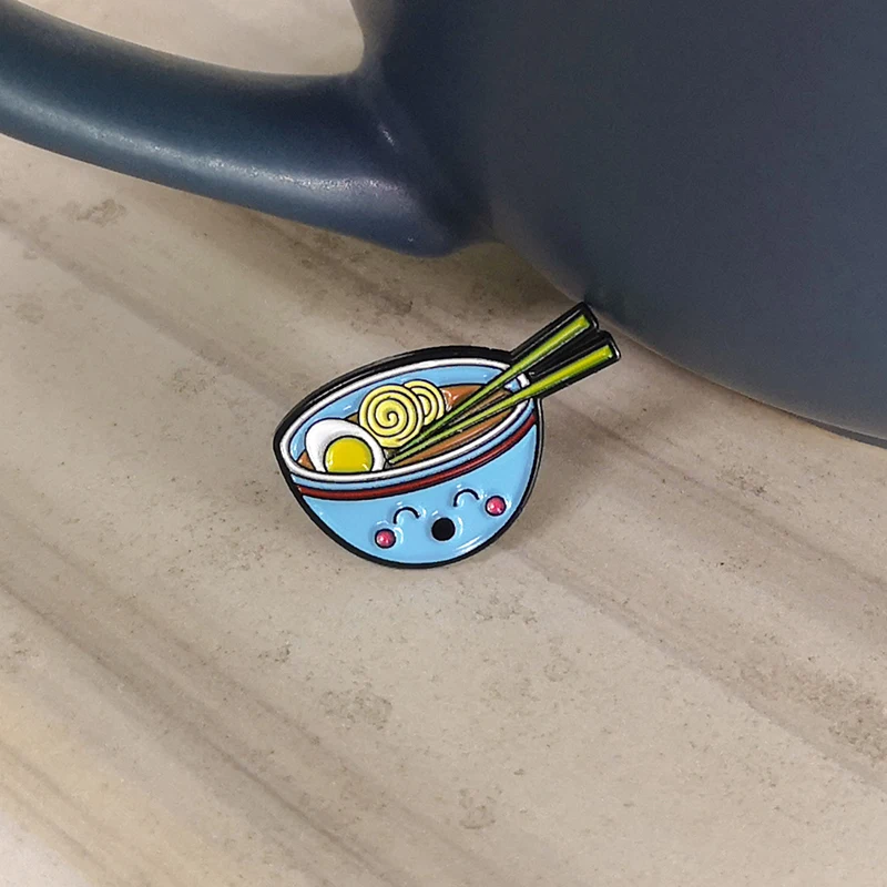 Japanese ramen enamel Pin Cute Blue bowl chopsticks Brooches cartoon food lapel Pins Badges Delicious noodles Jewelry Satisfying
Japanese ramen enamel Pin Cute Blue bowl chopsticks Brooches cartoon food lapel Pins Badges Delicious noodles Jewelry Satisfying