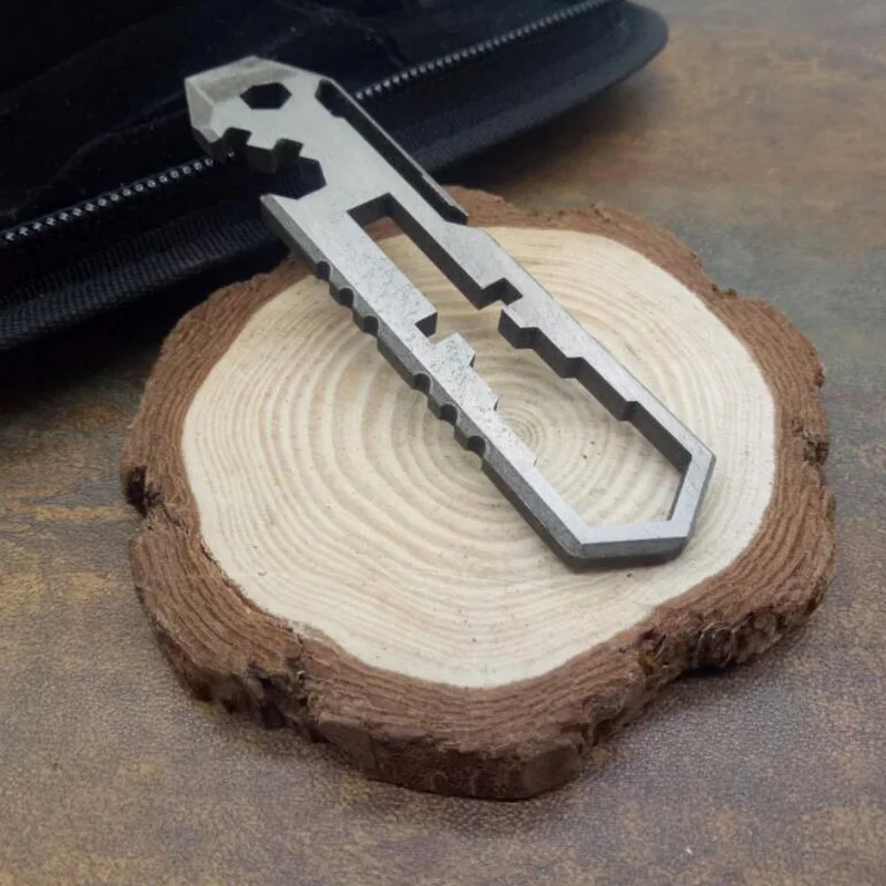 Outdoor EDC Portable Multifunctional Tool, Opener, Wrench, Titanium Tool, Keychain Pendant, Survival Window Breaker
Outdoor EDC Portable Multifunctional Tool, Opener, Wrench, Titanium Tool, Keychain Pendant, Survival Window Breaker