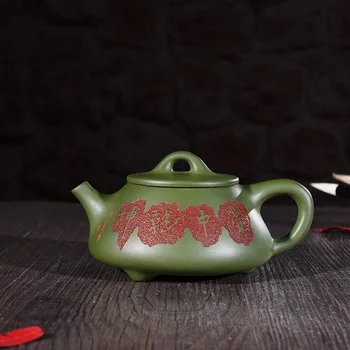 Yixing recommended authentic handmade undressed ore chlorite shake qiankun stone gourd ladle pot of kung fu tea tea set
Yixing recommended authentic handmade undressed ore chlorite shake qiankun stone gourd ladle pot of kung fu tea tea set