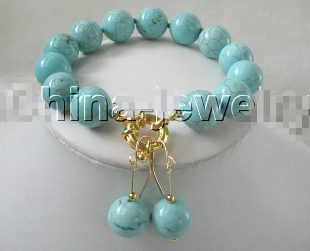 Free shipping Beautiful 8" perfect round 14mm turquoise bracelet & earring set 
Free shipping Beautiful 8" perfect round 14mm turquoise bracelet & earring set