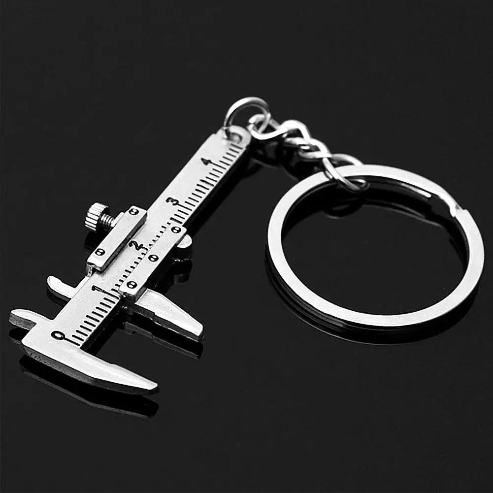 Zinc Alloy Creative Fashion Mini Simulation Slide Movable Ruler Vernier Caliper Model Keychain Key Chain Keyring Women Jewelry N
Zinc Alloy Creative Fashion Mini Simulation Slide Movable Ruler Vernier Caliper Model Keychain Key Chain Keyring Women Jewelry N