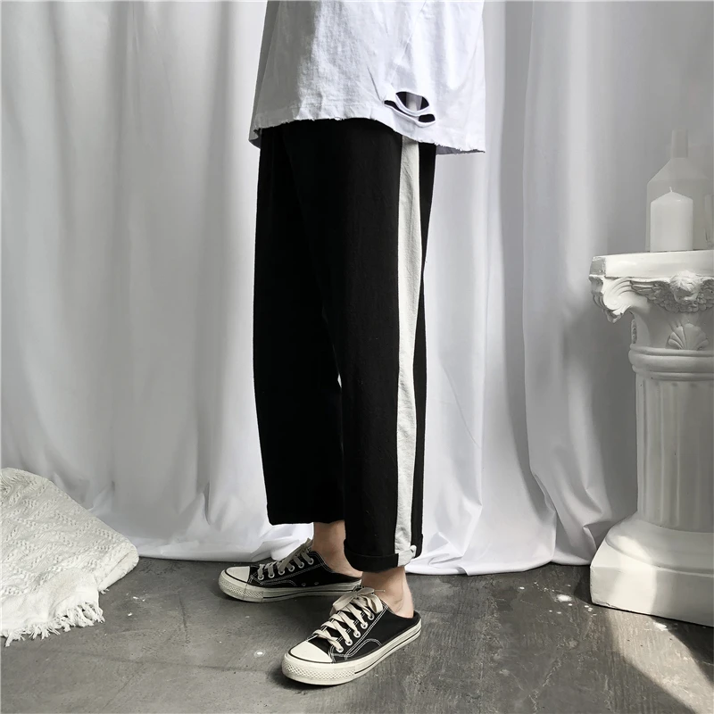 2019 Summer New Korean Version Of The Tide Male College Wind Comfortable High Quality Solid Color Sports Loose Casual Trousers 
2019 Summer New Korean Version Of The Tide Male College Wind Comfortable High Quality Solid Color Sports Loose Casual Trousers