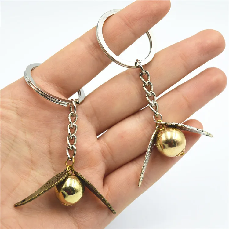 Movie Jewelry Harry Style Golden Snitch Pendent Keychain Vintage Style Angel Wing Charm Keychain For Men women Keyring
Movie Jewelry Harry Style Golden Snitch Pendent Keychain Vintage Style Angel Wing Charm Keychain For Men women Keyring