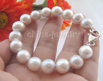 AAA 8" 11.5mm white round freshwater pearl bracelet - 925 silver claspe SHIPPING 5.25
AAA 8" 11.5mm white round freshwater pearl bracelet - 925 silver claspe SHIPPING 5.25