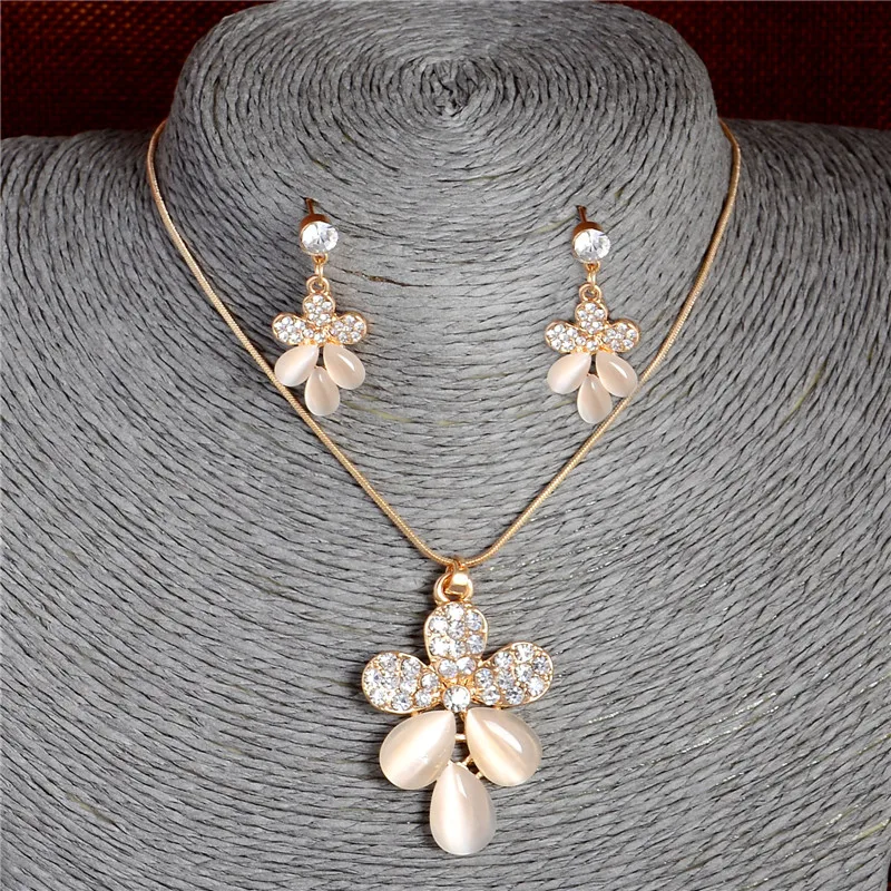 Korean Fashion Crystal Pendant Necklace Women Stud Earrings Opal Cat's Eye Stones Flower Jewelry Sets Wedding
Korean Fashion Crystal Pendant Necklace Women Stud Earrings Opal Cat's Eye Stones Flower Jewelry Sets Wedding