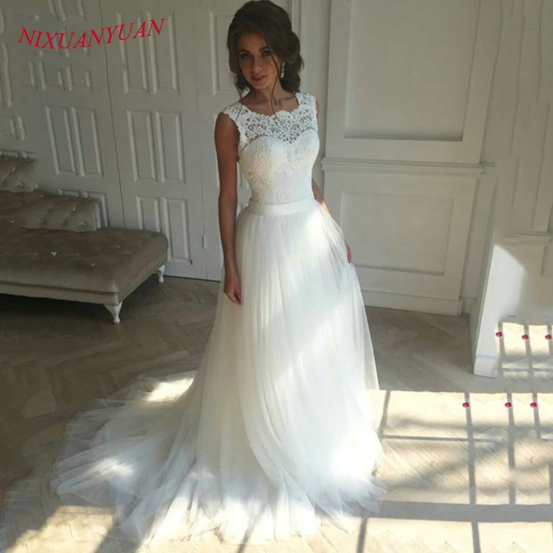 NIXUANYUAN New Lace O-Neck Lace Tulle Boho Cheap Wedding Dress 2018 Beach Bridal Gown Bohemian Wedding Gowns robe de mariage
NIXUANYUAN New Lace O-Neck Lace Tulle Boho Cheap Wedding Dress 2018 Beach Bridal Gown Bohemian Wedding Gowns robe de mariage
