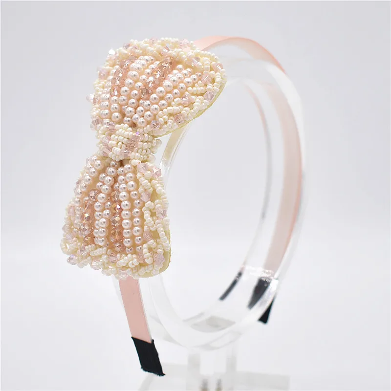 Bows of imitation pearl Hairband Boutique Bow Headband hair band layers for hair accessories of the girl child 1pcs
Bows of imitation pearl Hairband Boutique Bow Headband hair band layers for hair accessories of the girl child 1pcs