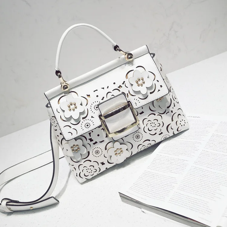 2019 summer new European and American fashion hollow flower portable women's casual shoulder bag
2019 summer new European and American fashion hollow flower portable women's casual shoulder bag