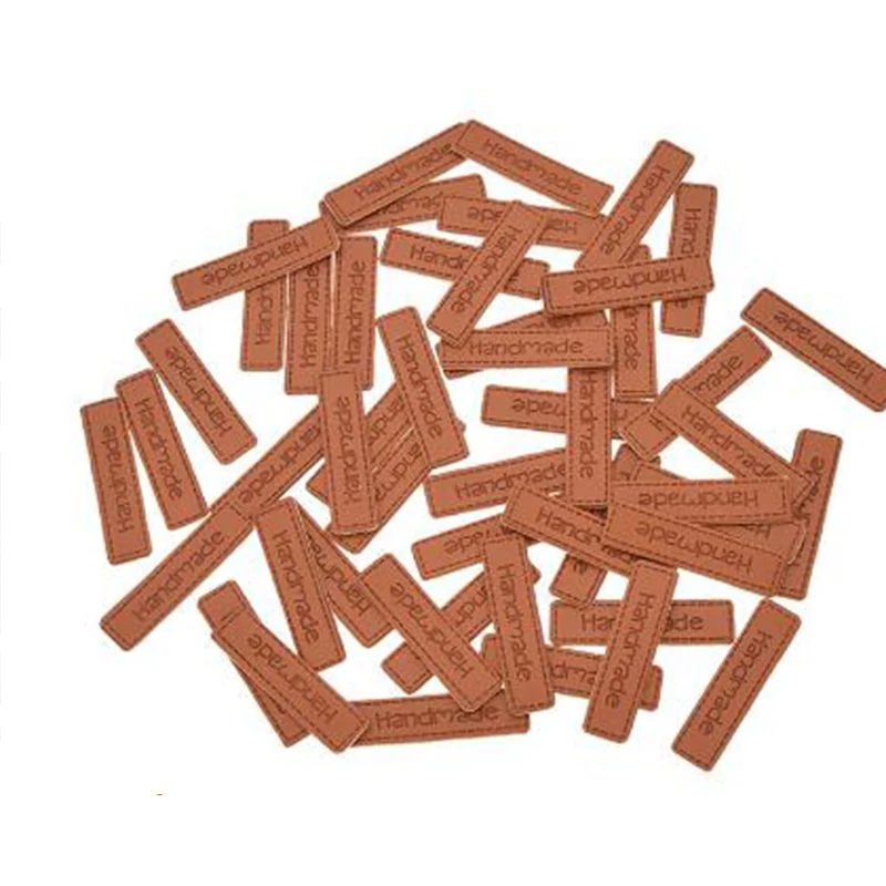 50pcs Handmade Letter Pattern PU Leather Tags Rectangle Embossed Label DIY Flag Labels Garment Sewing Accessories Can customized
50pcs Handmade Letter Pattern PU Leather Tags Rectangle Embossed Label DIY Flag Labels Garment Sewing Accessories Can customized