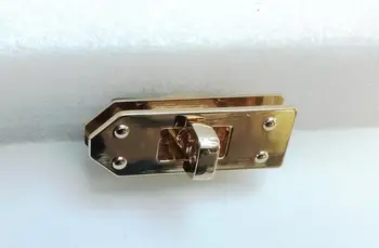 46x16x6mm Light gold DIY fashion bag lock purse lock, handbag lock, Bag parts, metal parts, Bag hardware accessories
46x16x6mm Light gold DIY fashion bag lock purse lock, handbag lock, Bag parts, metal parts, Bag hardware accessories