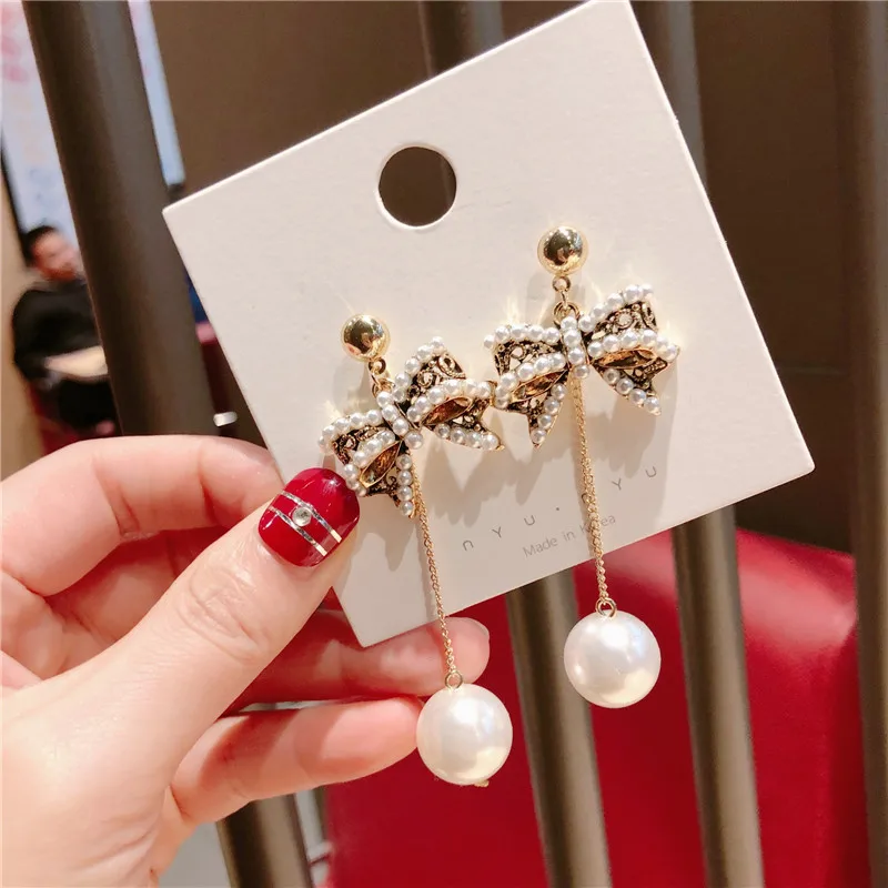 Korean fashion earrings bowknot pearl long silver needle ear nail Earrings dangle earrings lilly pulitzer
Korean fashion earrings bowknot pearl long silver needle ear nail Earrings dangle earrings lilly pulitzer
