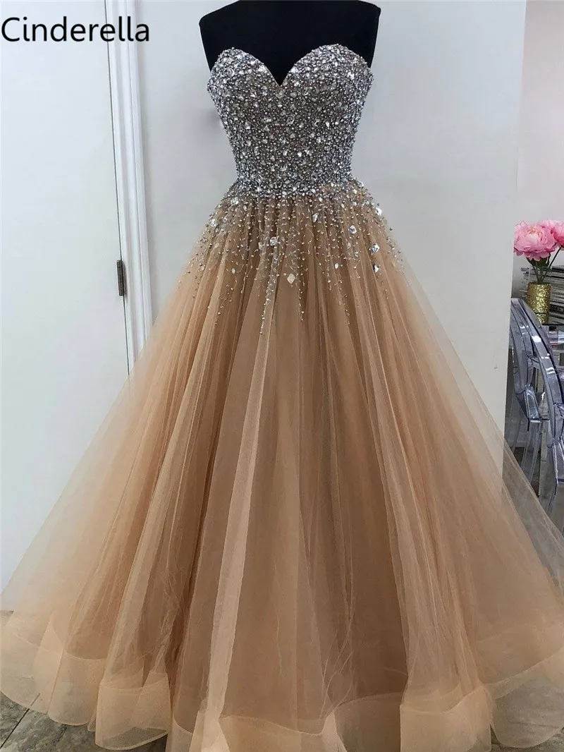 Cinderella Champagne Sweetheart Sleeveless Crystal Beaded Ball Gown Evening Dresses Shining Crystal Tulle Evening Dresses
Cinderella Champagne Sweetheart Sleeveless Crystal Beaded Ball Gown Evening Dresses Shining Crystal Tulle Evening Dresses