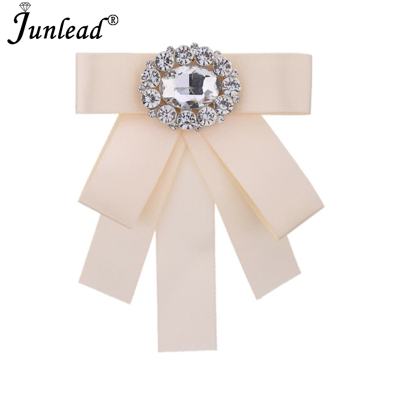 Junlead Latest design Brosches Wedding White Ribbon Fabric brooch with big Crystal Bow Brooch pin for women shirt clothing Dress
Junlead Latest design Brosches Wedding White Ribbon Fabric brooch with big Crystal Bow Brooch pin for women shirt clothing Dress
