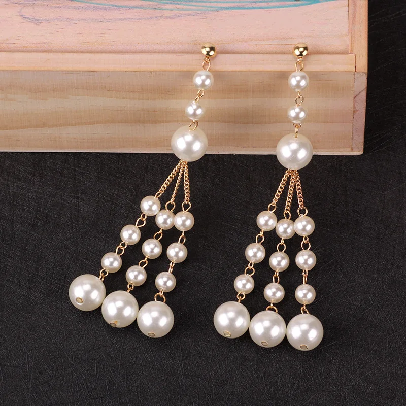 2018 New European Fashion Gold Pearl Stud Earrings Ear Hyperbole Fringe Charm Pendant Long Earrings Women Jewelry Dropshipping
2018 New European Fashion Gold Pearl Stud Earrings Ear Hyperbole Fringe Charm Pendant Long Earrings Women Jewelry Dropshipping