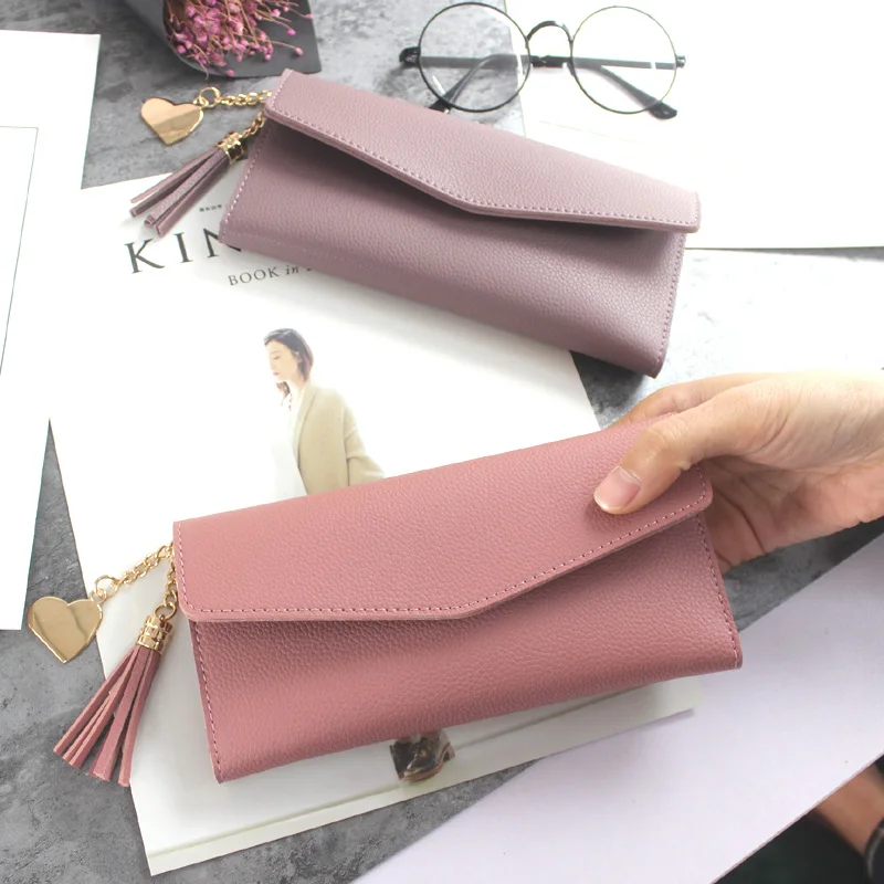 Long Leather Wallet Women Purses New Tri-fold Tassel Ladies Wallet PU Purse Heart-shaped Pendant Clutch Card Holder Phone Bag
Long Leather Wallet Women Purses New Tri-fold Tassel Ladies Wallet PU Purse Heart-shaped Pendant Clutch Card Holder Phone Bag
