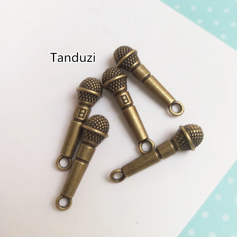 Tanduzi 10pcs Alloy 3D Cute Antique Bronze Microphone Pendant Model DIY 1:12 Dollhouse Miniature Decoration Microphone Crafts
Tanduzi 10pcs Alloy 3D Cute Antique Bronze Microphone Pendant Model DIY 1:12 Dollhouse Miniature Decoration Microphone Crafts
