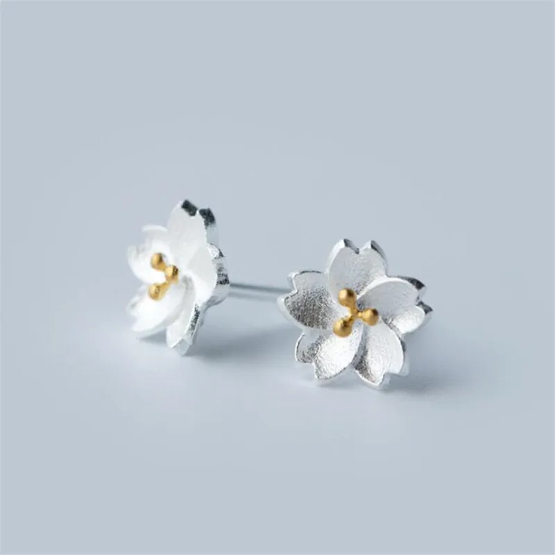 New Fashion Jewelry Sweet Flowers 925 Sterling Silver Personality Cherry Blossom Women Exquisite Stud Earrings E9
New Fashion Jewelry Sweet Flowers 925 Sterling Silver Personality Cherry Blossom Women Exquisite Stud Earrings E9