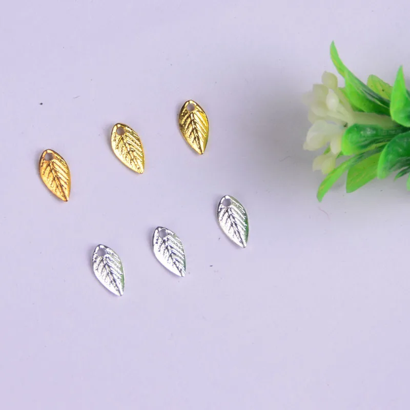 100pcs/lot copper material gold silver color cute leaf charm pendant accessories for bracelet DIY jewelry making
100pcs/lot copper material gold silver color cute leaf charm pendant accessories for bracelet DIY jewelry making