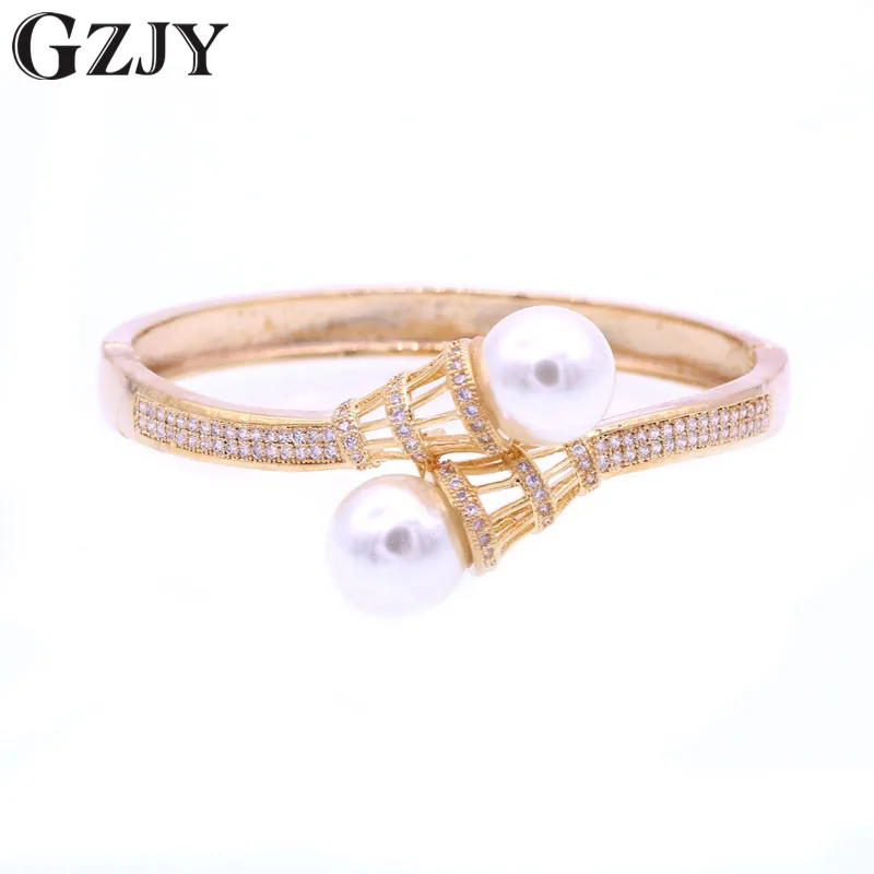 GZJY Gorgeous Pearl Zircon Champagne Gold Color Cuff Bracelet Bangle For Women Fashion CZ Jewelry Birthday Gift pulseiras bijoux
GZJY Gorgeous Pearl Zircon Champagne Gold Color Cuff Bracelet Bangle For Women Fashion CZ Jewelry Birthday Gift pulseiras bijoux