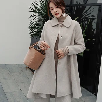 JECH Autumn and winter new fashion loose women's wool coat 100% wool coat lapel cloak decorated wool fabric warm women's coat
JECH Autumn and winter new fashion loose women's wool coat 100% wool coat lapel cloak decorated wool fabric warm women's coat