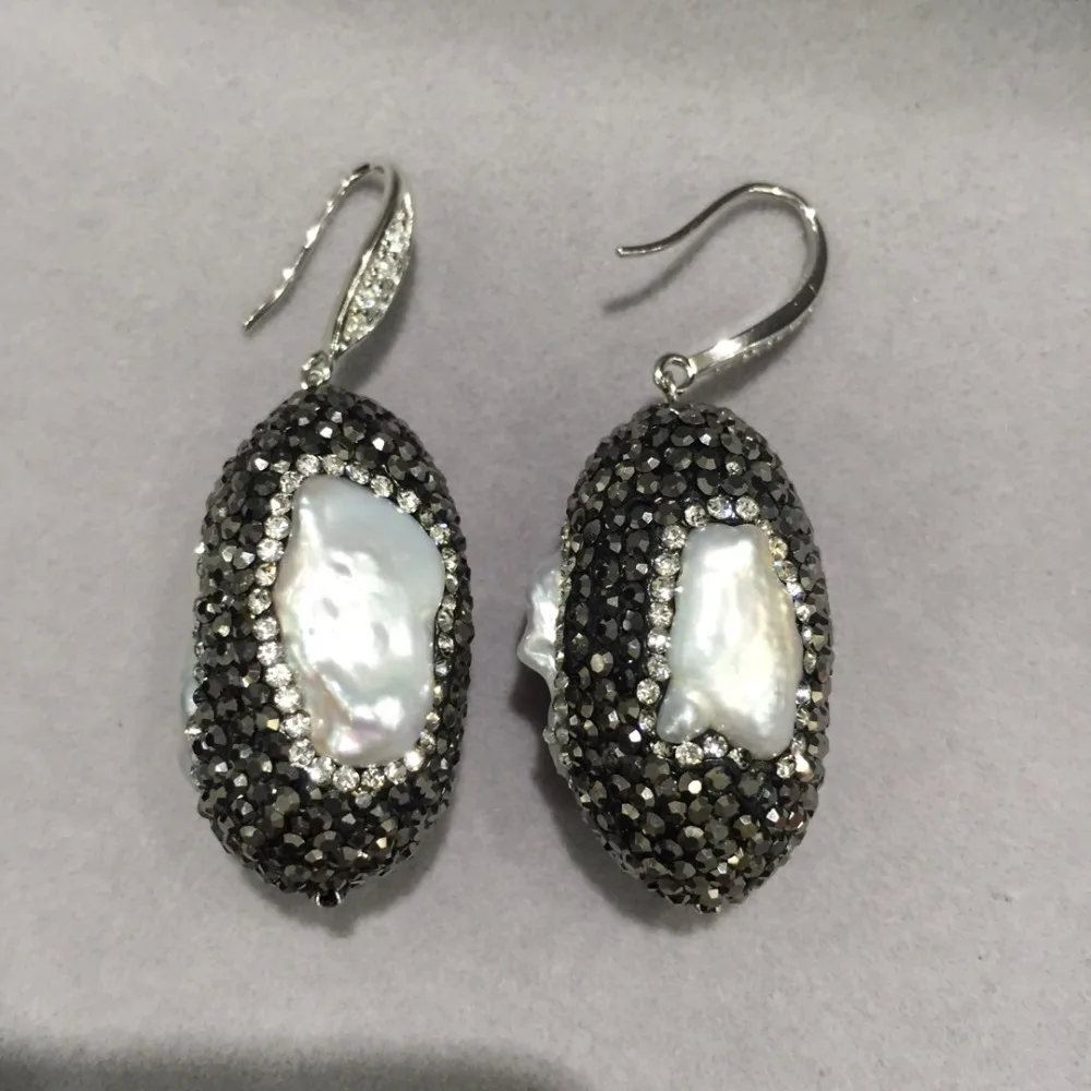 Женские серьги-капельки keshi из серебра 925 пробы с натуральным пресноводным жемчугом
Женские серьги-капельки keshi из серебра 925 пробы с натуральным пресноводным жемчугом
