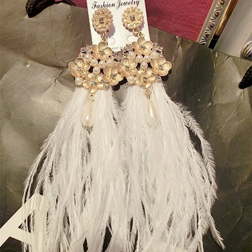 Baroque crystal pearl Flowers white feather long Tassel earrings Bohemia wedding jewelry for women girl
Baroque crystal pearl Flowers white feather long Tassel earrings Bohemia wedding jewelry for women girl