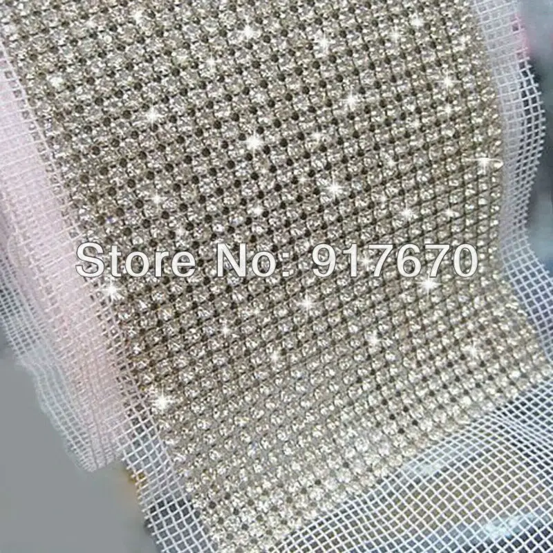 24 rows sew on SS16 crystal rhinestone mesh banding trim Silver base White fabric Use for decoration 5yards/roll
24 rows sew on SS16 crystal rhinestone mesh banding trim Silver base White fabric Use for decoration 5yards/roll