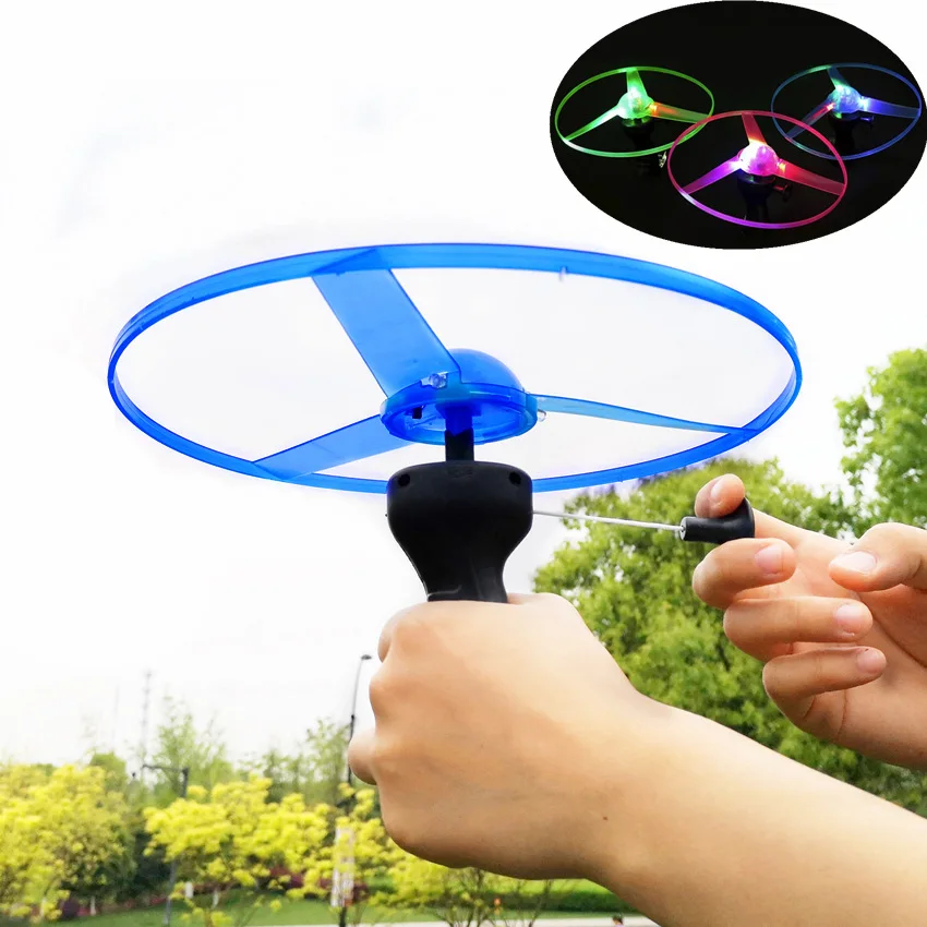 flying saucer pull string toy