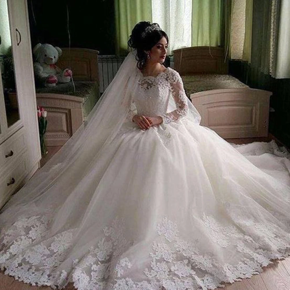Ball Gown Wedding Dresses 2019 Crew Neckline Lace Appliques Long Transparent Sleeve Puffy Floor Length Bridal Dresses Gowns
Ball Gown Wedding Dresses 2019 Crew Neckline Lace Appliques Long Transparent Sleeve Puffy Floor Length Bridal Dresses Gowns
