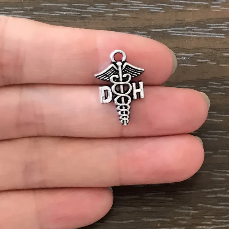 10PCS DIY Jewelry DH Dental Hygientist Charms Antique Silver Tone Pendant Charm for Bracelet Necklace Earrings Zipper Pulls
10PCS DIY Jewelry DH Dental Hygientist Charms Antique Silver Tone Pendant Charm for Bracelet Necklace Earrings Zipper Pulls