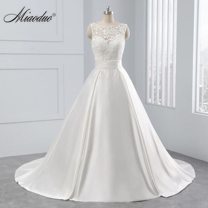 Miaoduo Appliques Lace Ball Gown Sleeveless Wedding Dresses with Sashes 2019 Scoop Simple Bridal Gowns Vestido De Noiva
Miaoduo Appliques Lace Ball Gown Sleeveless Wedding Dresses with Sashes 2019 Scoop Simple Bridal Gowns Vestido De Noiva