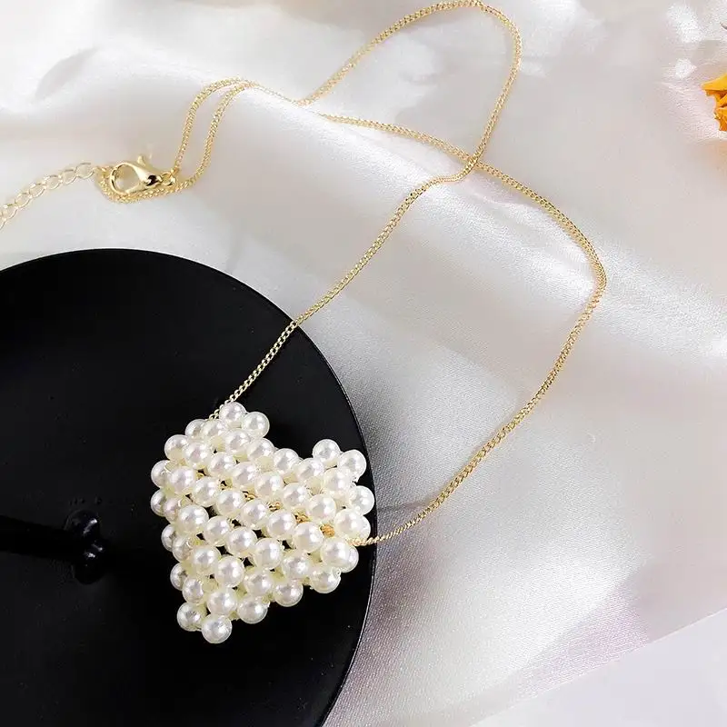 Korean Pearl Heart Necklace Women 2019 New Handmade Weave Choker Simple Necklaces & Pendants
Korean Pearl Heart Necklace Women 2019 New Handmade Weave Choker Simple Necklaces & Pendants