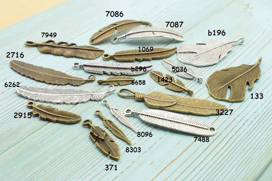 New Hot Sale! Mixture Styleantique bronze and silver lovely delicate feather Charm pendan Jewelry fun gift h21
New Hot Sale! Mixture Styleantique bronze and silver lovely delicate feather Charm pendan Jewelry fun gift h21