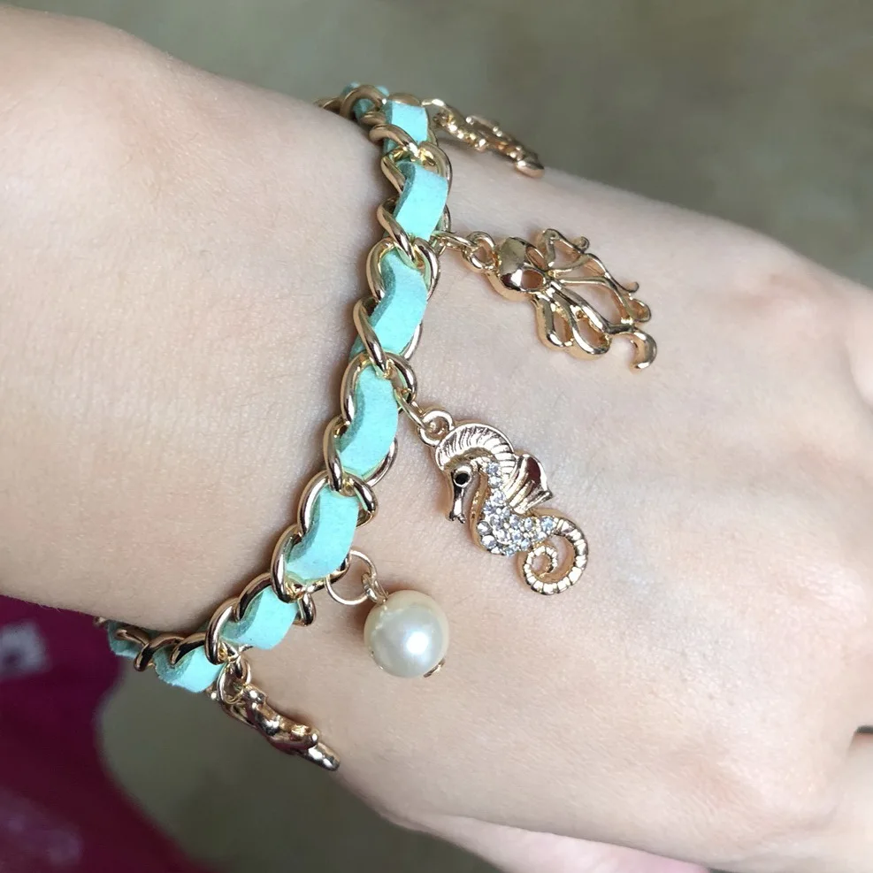 Fashion Bohemia Style DIY Sea Elements Anchor Rudder Starfish Shell Seahorse Octopus Imitation Pearl Charms Bracelet
Fashion Bohemia Style DIY Sea Elements Anchor Rudder Starfish Shell Seahorse Octopus Imitation Pearl Charms Bracelet