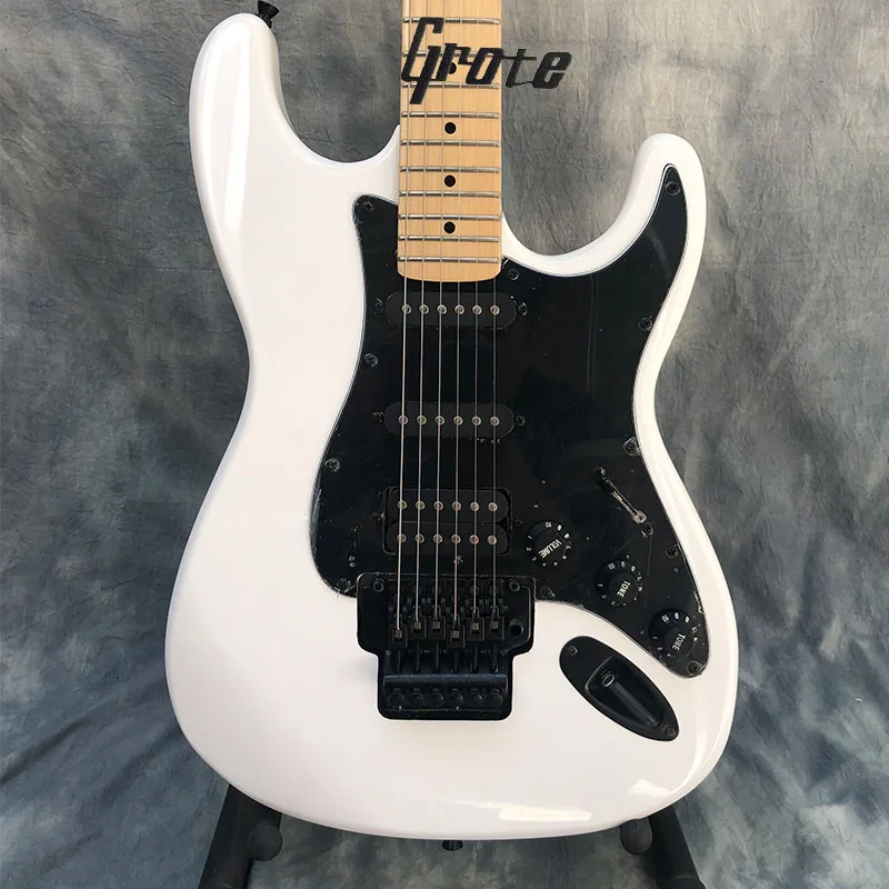 Grote, white double vibrato system electric guitar, rosewood fingerboard, black accessories factory supports customization
Grote, white double vibrato system electric guitar, rosewood fingerboard, black accessories factory supports customization
