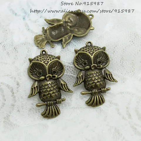 Sweet Bell (15 pieces/lot) 27*42mm Antique Bronze Metal Alloy Lovely Owl Charms Pendant Charms Animal Charm D0571
Sweet Bell (15 pieces/lot) 27*42mm Antique Bronze Metal Alloy Lovely Owl Charms Pendant Charms Animal Charm D0571