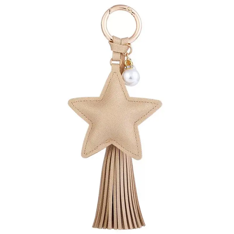 Creative PU leather tassel key ring cute bag pendant leather five-pointed star car key chains fashion charm keychain
Creative PU leather tassel key ring cute bag pendant leather five-pointed star car key chains fashion charm keychain