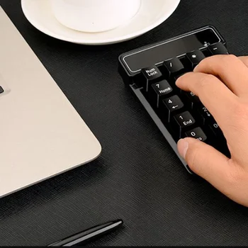 New 2.4GHz Mini USB Wireless Numeric Keypad 19 Keys Number Pad Numpad Receiver For Windows XP/7/ 8 Laptop PC Computer DOM668
New 2.4GHz Mini USB Wireless Numeric Keypad 19 Keys Number Pad Numpad Receiver For Windows XP/7/ 8 Laptop PC Computer DOM668